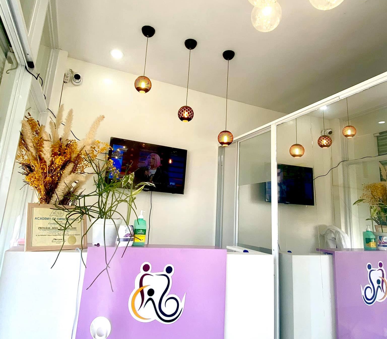 Modern dental office with patient and dentist